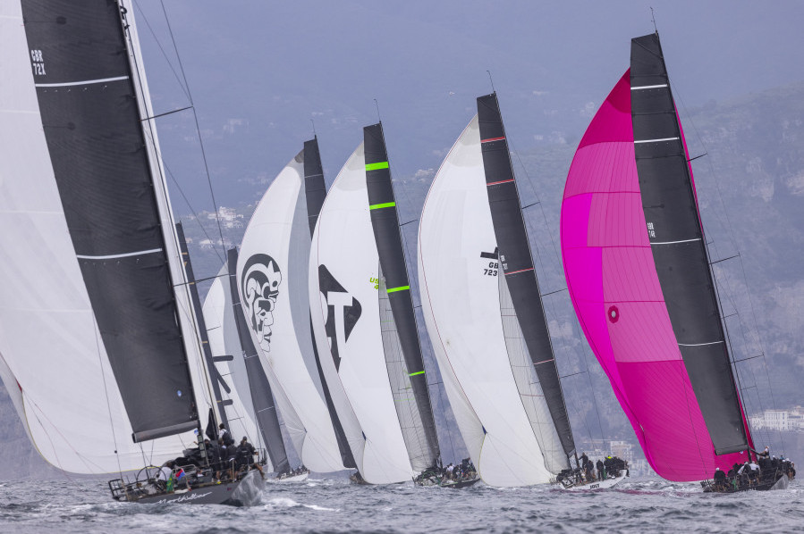 Maxi Grand Prix fleet chases Bullitt and Galateia down the run. Photo: IMA/Studio Borlenghi