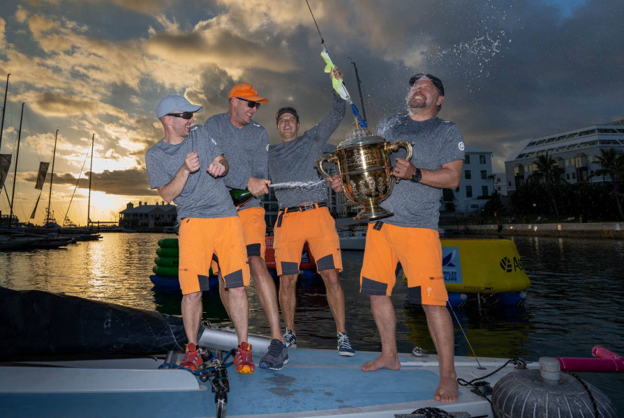 A jubilant Berntsson Sailing Team of Johnie Berntsson, Herman Andersson, Oscar Angervall and Björn Lundgren lifting the King Edward VII Gold Cup for the fourth time  Photo: Ian Roman/WMRT