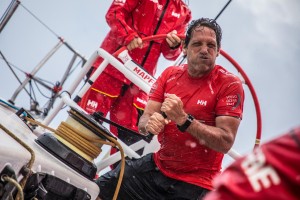 Leg 8 from Itajai to Newport, day 03 on board MAPFRE, Juan Vila trimming the runner during a big squall. 24 April, 2018.