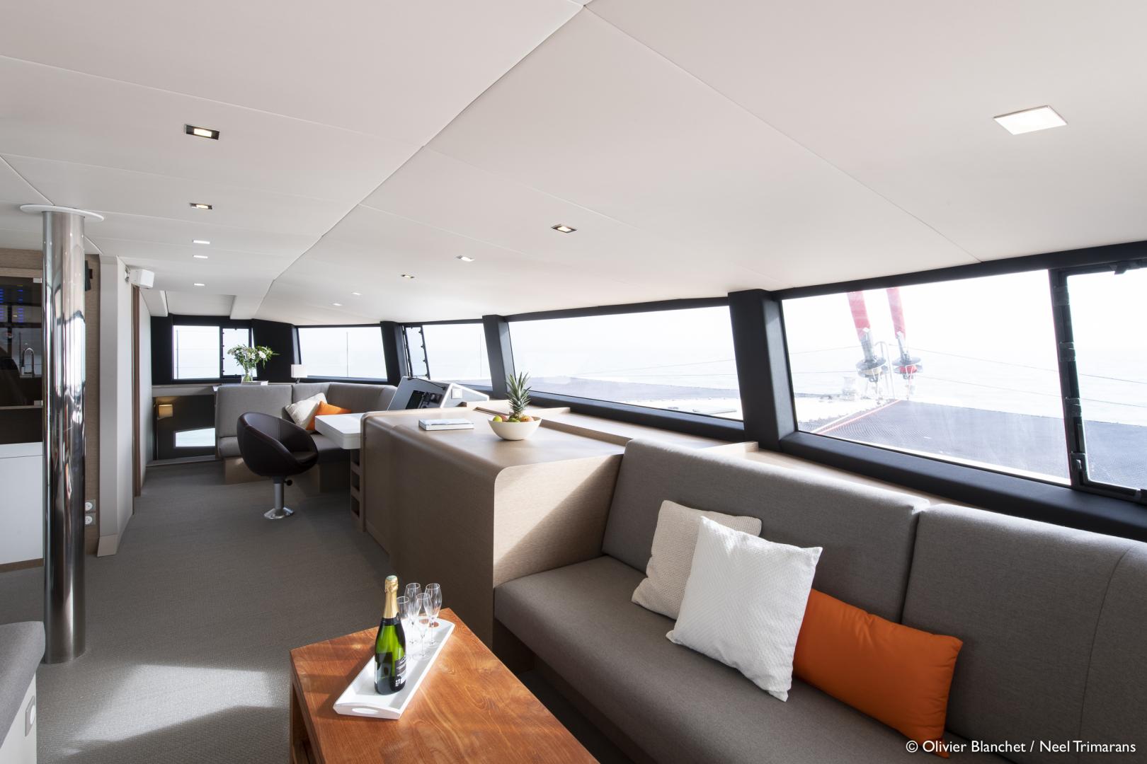 The front end of a Neel 65’s bridgedeck has two separate lounge seating areas, either side of the yacht’s main nav station.
