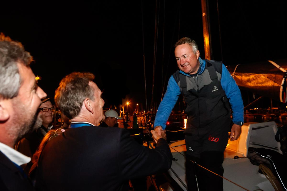 RORC CEO Jeremy Wilton and Race Director, Chris Stone congratulate RORC Commodore, James Neville and the Ino XXX crew ﻿© Paul Wyeth/pwpictures.com