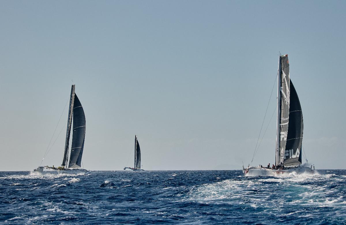 The powerful multihulls head off after the start of the RORC Transatlantic Race