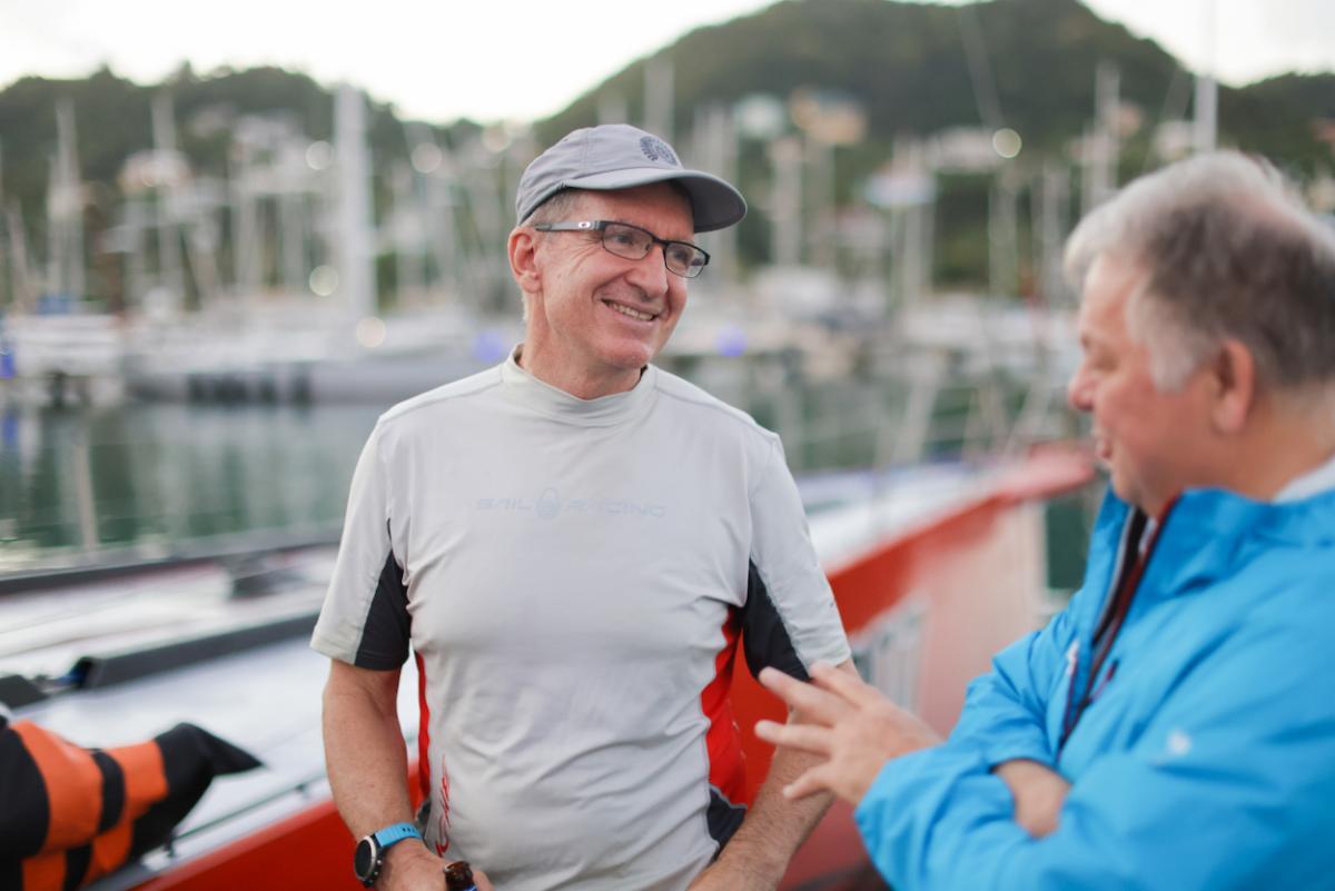 Comanche's Australian navigator Will Oxley explains to Race Reporter, Louay Habib, the weather conditions which made for a complex winning solution 