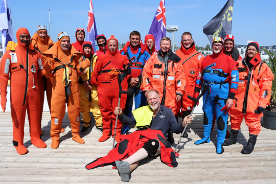 Tapio Lehtinen in his survival suit. All of the skippers underwent sea survival training before the race start. Credit: Nora Havel/GGR2022.