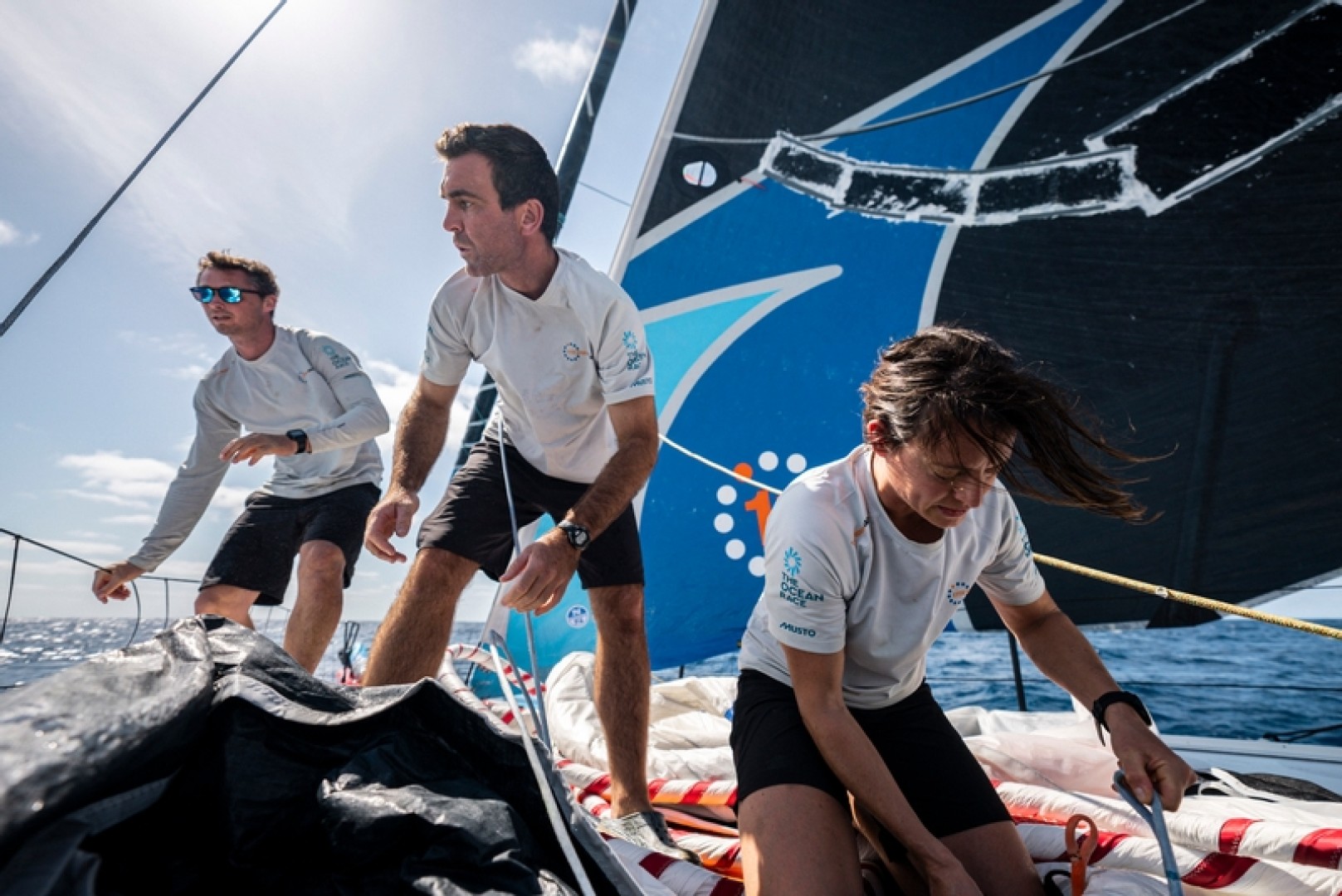 Onboard 11th Hour Racing Team during Leg 2, Day 3. Justine Mettraux, Charlie Enright and Jack Bouttell on the bow during a spinnaker peel.
© Amory Ross / The Ocean Race