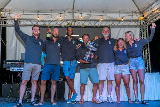 A happy team on Geoff Manchester's J/133 Vamoose (USA) - celebrating their overall win at the Peters & May Round Antigua Race © Visual Echo