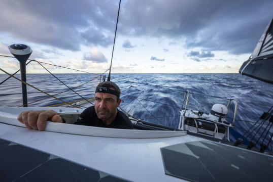 The Ocean Race 2022-23 - 28 April 2023, Leg 4 Day 5 onboard 11th Hour Racing Team. Charlie Enright keeps tabs on the weather outside in tricky conditions.
© Amory Ross / 11th Hour Racing / The Ocean Race