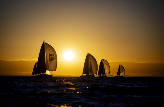 C class boats sailing towards the sunset © Sascha Klahn