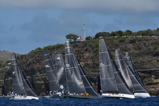 Hundreds of spectators watch the impressive start of the RORC Caribbean 600 from Fort Charlotte, Antigua © Rick Tomlinson