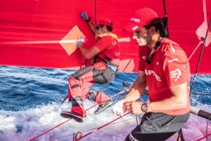 Leg 8 from Itajai to Newport, day 09 on board MAPFRE, Antonio Cuervas-Mons repairing a little hole in the sail with the help of Blair Tuke. 30 April, 2018. Ugo Fonolla/Volvo Ocean Race