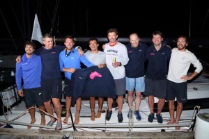 The crew of Dawn Treader enjoyed a cold Carib beer and warm welcome
after their close finish © Tim Wright/Photoaction.com