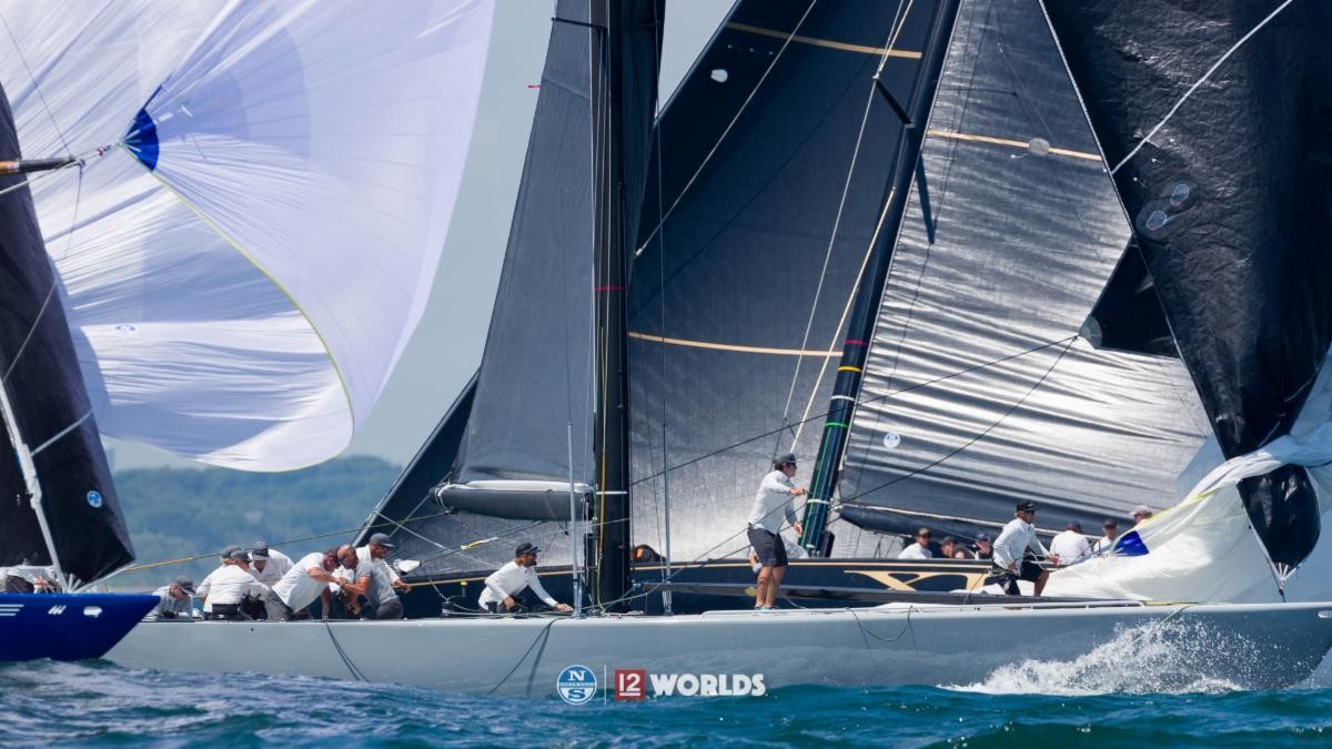 Enterprise (US-27) and Challenge XII (KA-10) vie for position while Freedom (US-30) nips at their heels during the 2019 12mR World Championship in New