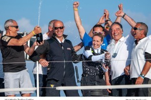 Nicola Paoleschi celebrates line honours victory with Alessandra Sensini and the crew of Pendragon VI.
