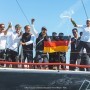 Another day of champagne sailing...literally! Gold medal winners HALBTROCKEN 4.5 celebrate victory in Class A
