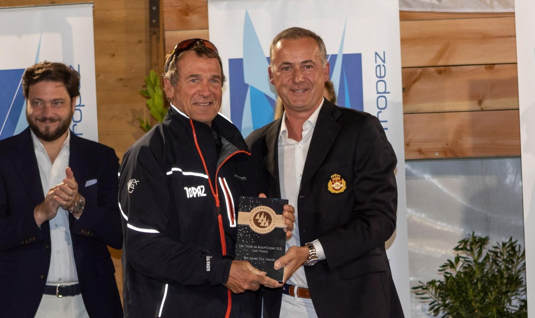 Peter Holmberg's accepts the prize for the 'top IMA boat' on behalf of Topaz. Photo: Gilles Martin-Raget / Les Voiles de Saint-Tropez