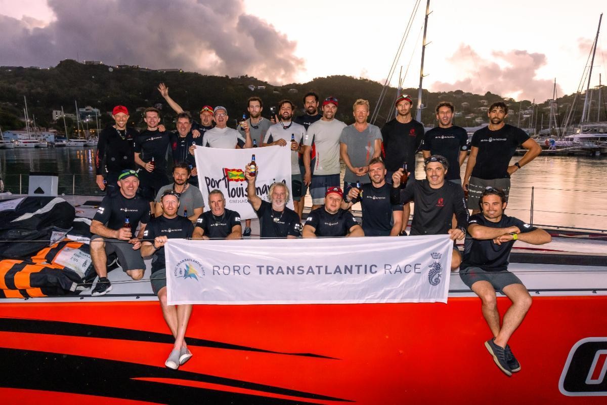 Comanche crew celebrate setting a new race record in the 2022 RORC Transatlantic Race after completing the race to Grenada in record time: 7d 22hrs 1m