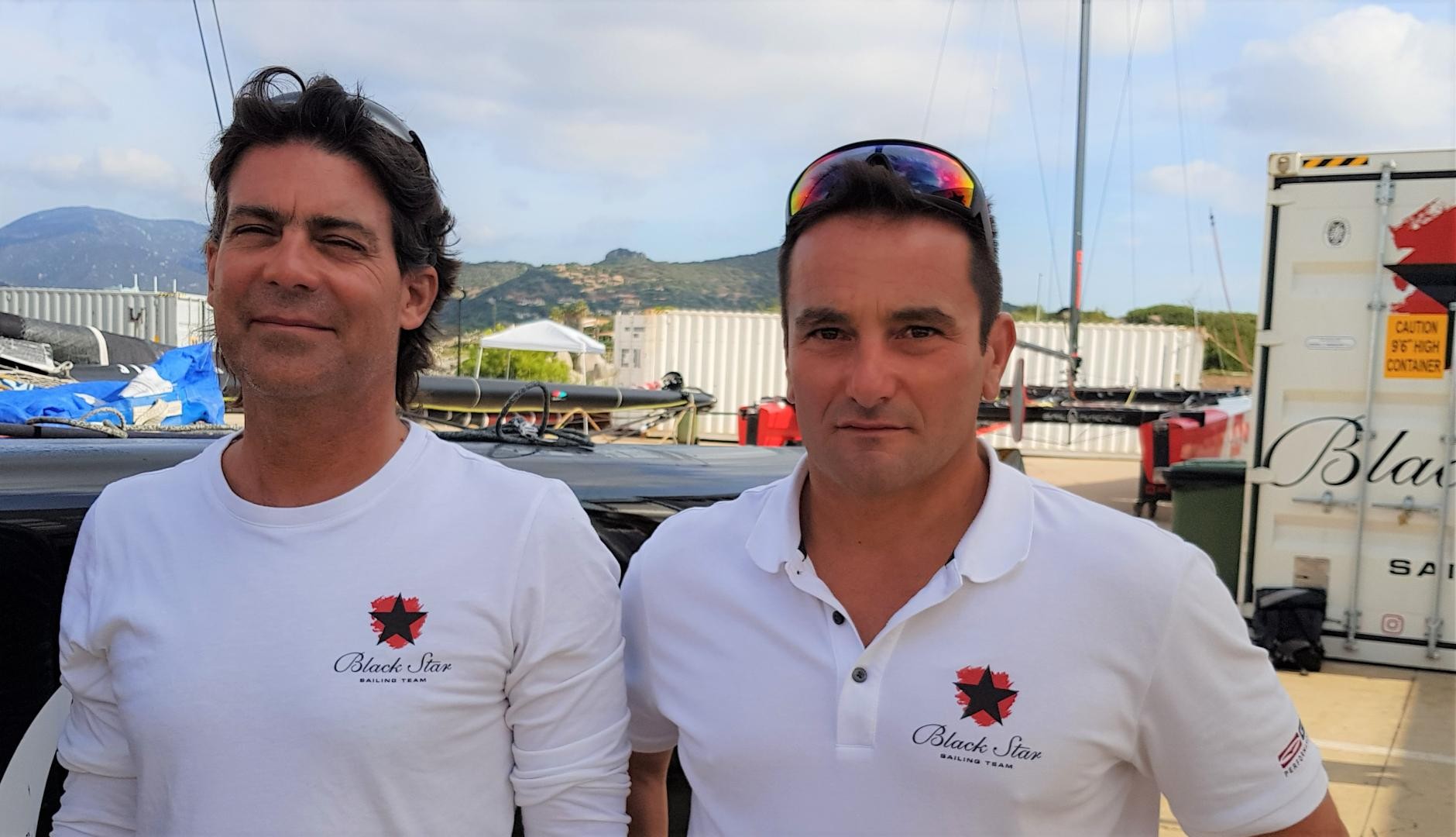 Black Star Sailing Team's Christian Zuerrer (left) with Pierluigi de Felice. Photo: GC32 Racing Tour. 