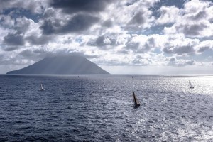 Fleet passing the active volcano of Stromboli