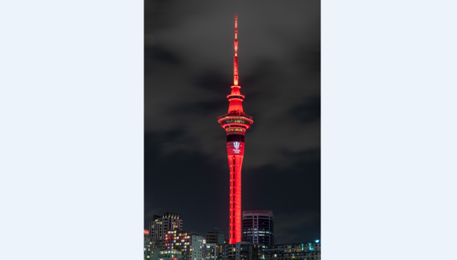 Auckland’s Sky Tower illuminated in red for the Prada Cup