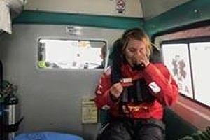 Susie Goodall enjoying a hot drink in the ambulance that carried her to hospital for a checkup after her arrival in Punta Arenas on 16th Dec.