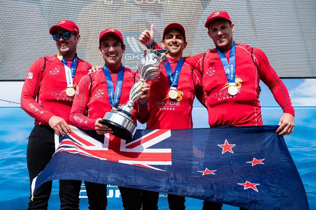 Skipper Phil Robertson (second from left) and crew are all smiles after winning the 2019 Open Match Racing World Championship