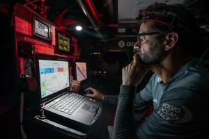 Leg 9, from Newport to Cardiff, day 03 on board Dongfeng. Pascal Bideggory while the boat is stuck in no wind during the night.
