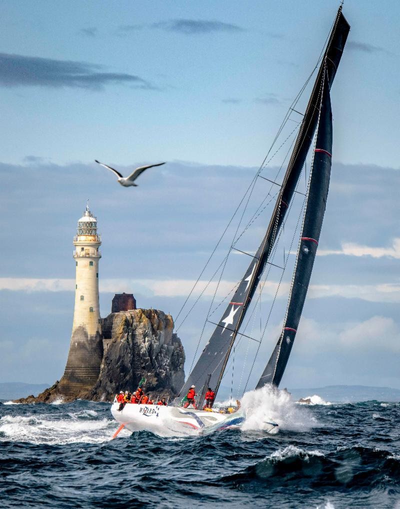 Wizard after rounding the symbol of the Rolex Fastnet Race - The Fastnet Rock