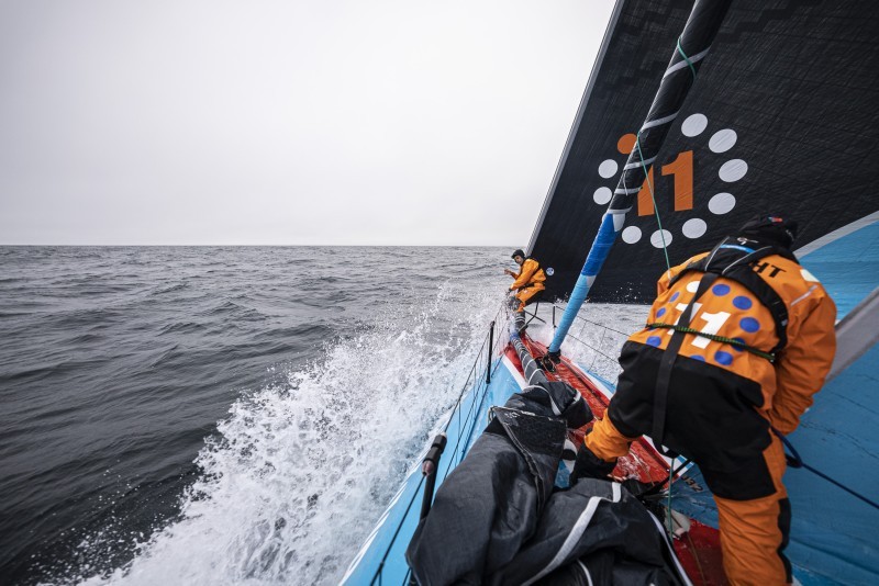 The Ocean Race 2022-23 - May 24, 2023 Leg 5 Day 3 onboard 11th Hour Racing Team . Malama enjoying flatter, calmer seas in the North Atlantic. Charlie Enright and Charlie Dalin working on the bow during a sail change. © Amory Ross / 11th Hour Racing / The Ocean Race