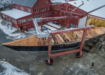 Hull of 95 foot sailing yacht Project Ouzel goes right side up under the snow