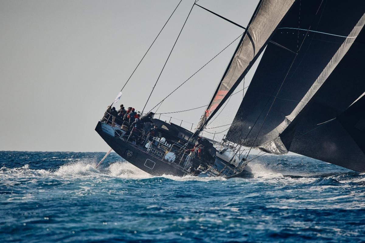A spectacular sight at the start of the 8th RORC Transatlantic Race - the 100ft canting keel Maxi Comanche, skippered by Mitch Booth 
