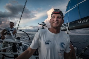 Leg 8 from Itajai to Newport, day 9 on board Turn the Tide on Plastic. 30 April, 2018. Henry Bomby enjoying the start of his off watch by watching the sun rise. James Blake/Volvo Ocean Race