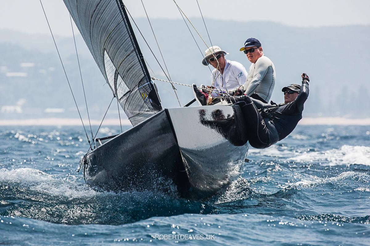 New Technical Committee Chairman Jamie MacPhail (middle) on Black Magicduring the 2020 World Championship in Pittwater