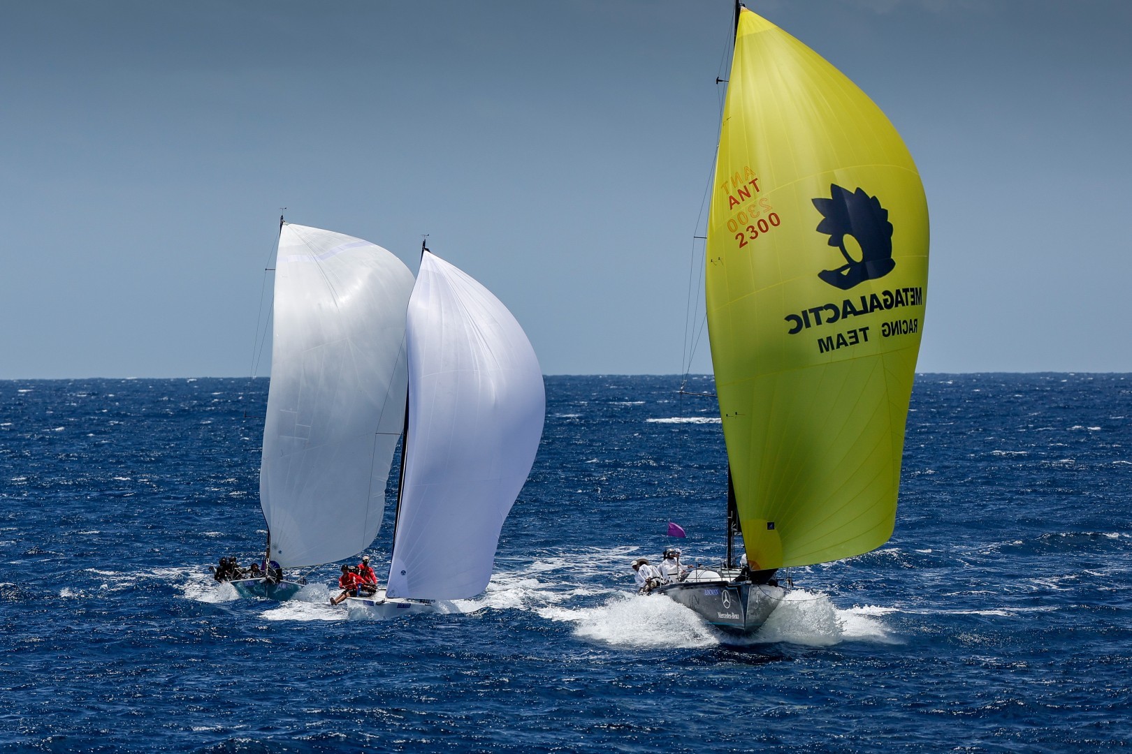 Spirit, Whiplash and Scia on a downwind leg of the 2022 Axxess Marine Y2K Race Day. ©pwpictures.com
