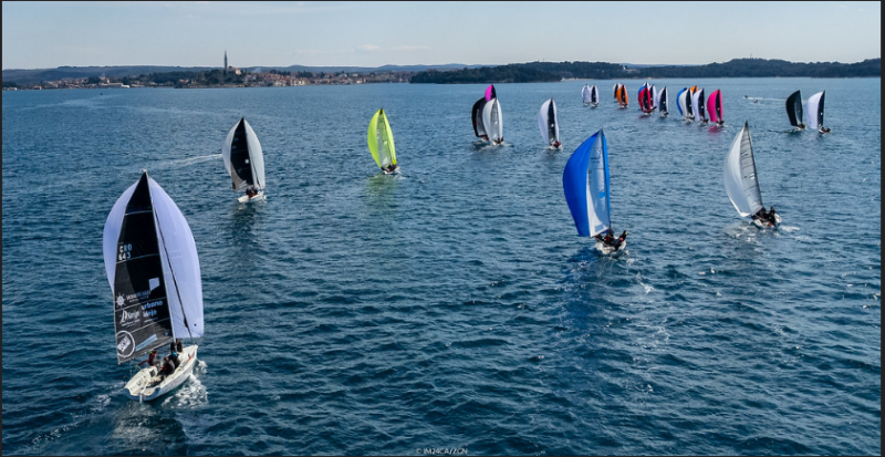 Sunday sailing in south-westerly wind up to 8,5 knots and sunshine, with the ancient city of Rovinj and the Church of St. Euphemia on the background - the opening event of the Melges 24 European Sailing Series 2022 © IM24CA / Zerogradinord