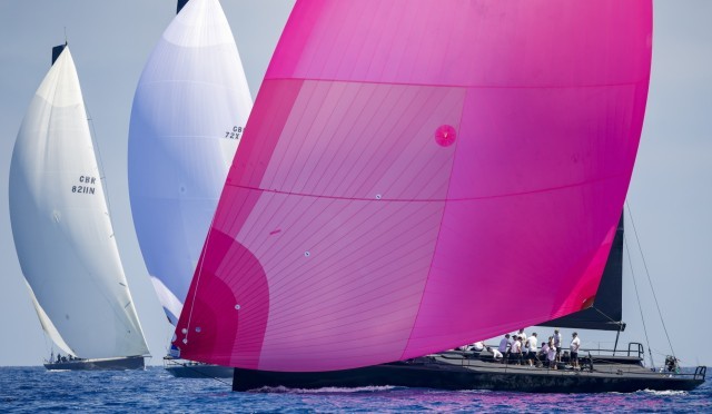The characteristic fuchsia coloured spinnaker of Sir Peter Ogden's Jethou.