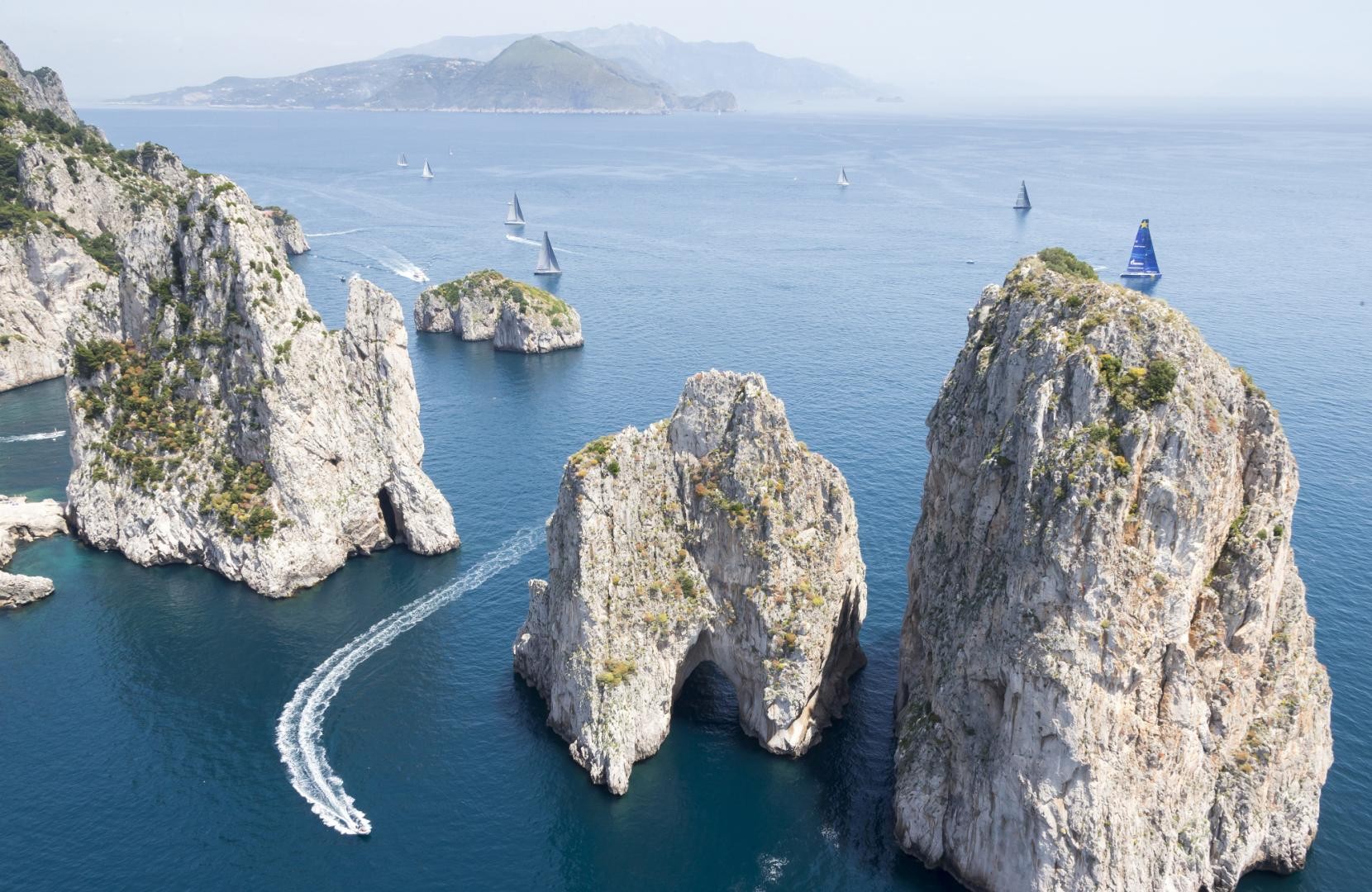 Capri is renowned for its impressive geology such as these 'faraglioni'. Photo: ROLEX / Carlo Borlenghi